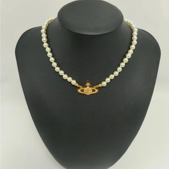Vivienne Westwood Pearl Necklace with Gold Mini Saturn Pendant